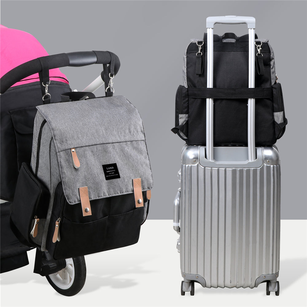 Eprolo large capacity diaper bag backpack for moms and dads, solid design with stroller organizer for baby care and travel.