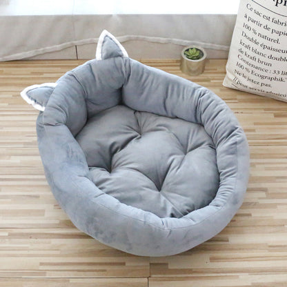 Thickened HOMCOM pet bed pad with a cartoon design and high backrest, providing comfortable support for small pets.