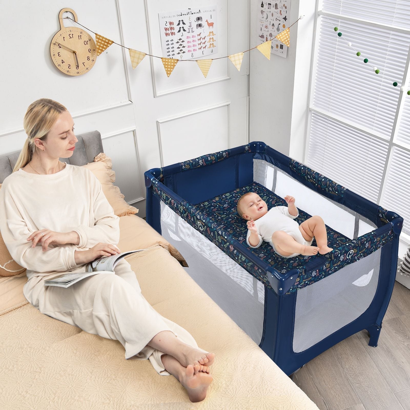 Livoshop 2-in-1 foldable baby playpen with lockable wheels and soft mattress for safe, versatile play and rest.