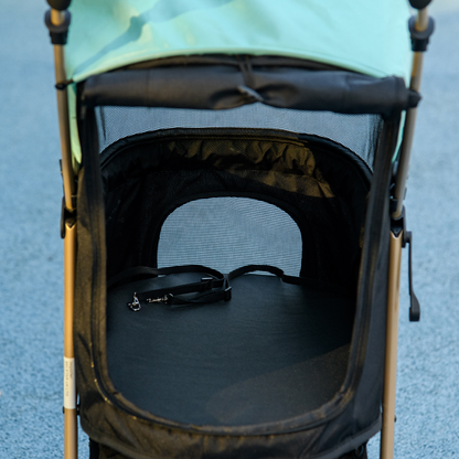 Green PawHut pet stroller for small dogs with a rain cover, featuring a compact design and mesh windows for ventilation.