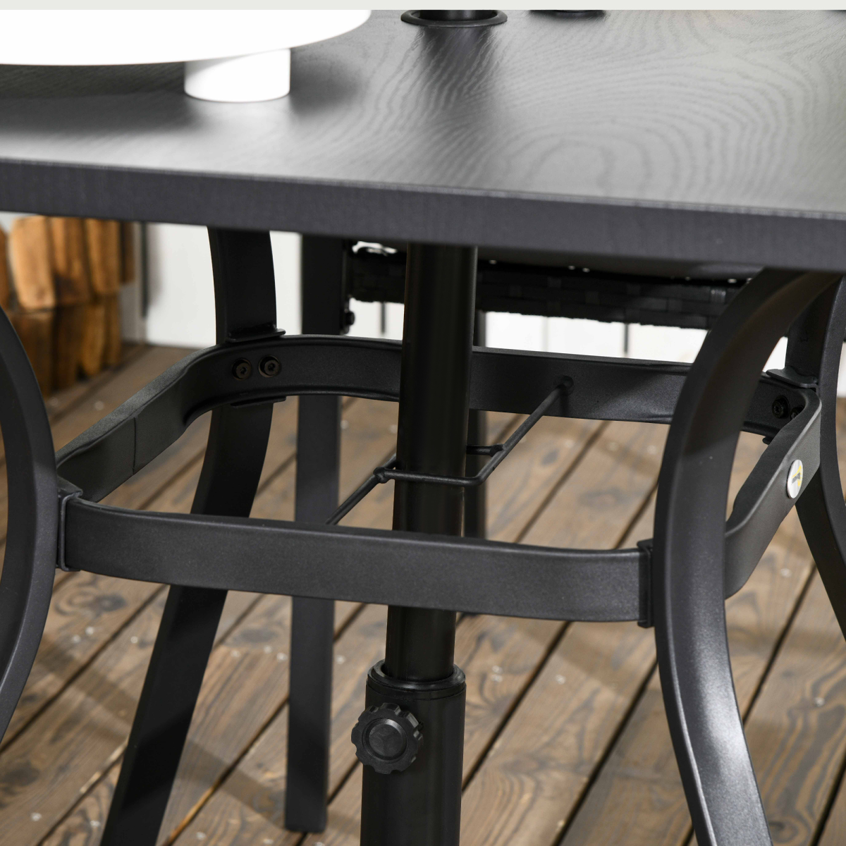 Black 4 seater outdoor rattan garden dining set with umbrella hole and matching chairs, designed for patio or backyard use.