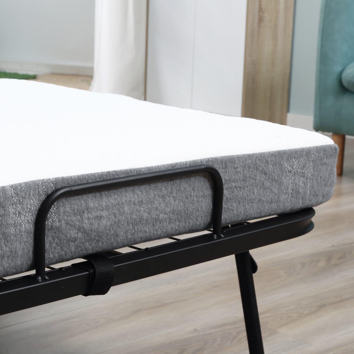 HOMCOM folding guest bed with a 10cm mattress, metal frame, portable and foldable for easy guest accommodations.