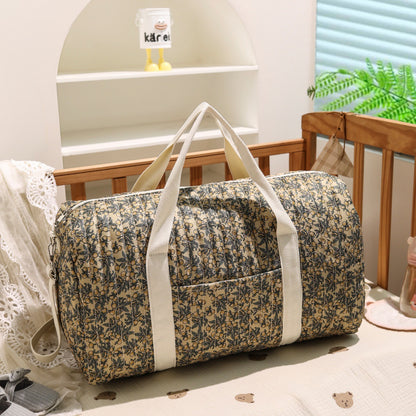 Large embroidered travel bag by eprolo with spacious design, sturdy handles, and decorative embroidery on durable fabric.