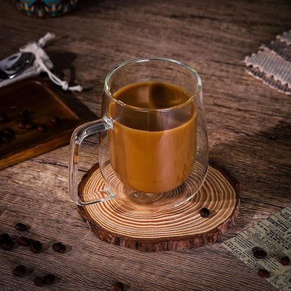 Set of two Vinsani double-walled coffee glasses with 305ml capacity, showcasing clear glass construction and ergonomic design.