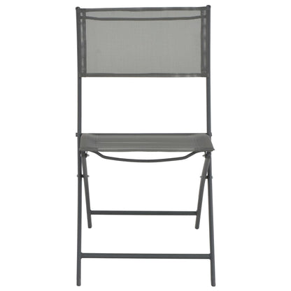 Two vidaXL folding outdoor chairs with steel frames and Textilene seats, shown in a relaxed outdoor setting.