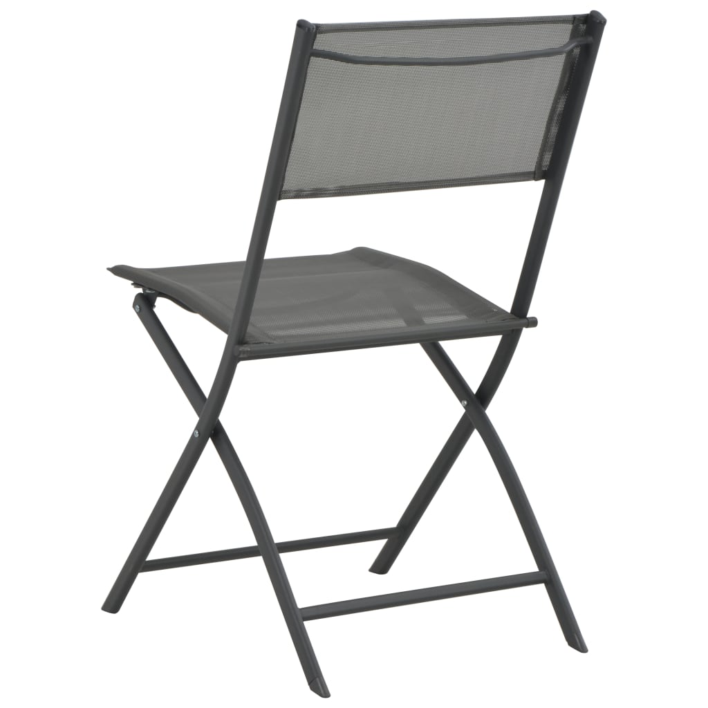 Pair of vidaXL folding outdoor chairs with steel frames and Textilene fabric, shown in a relaxed outdoor setting.