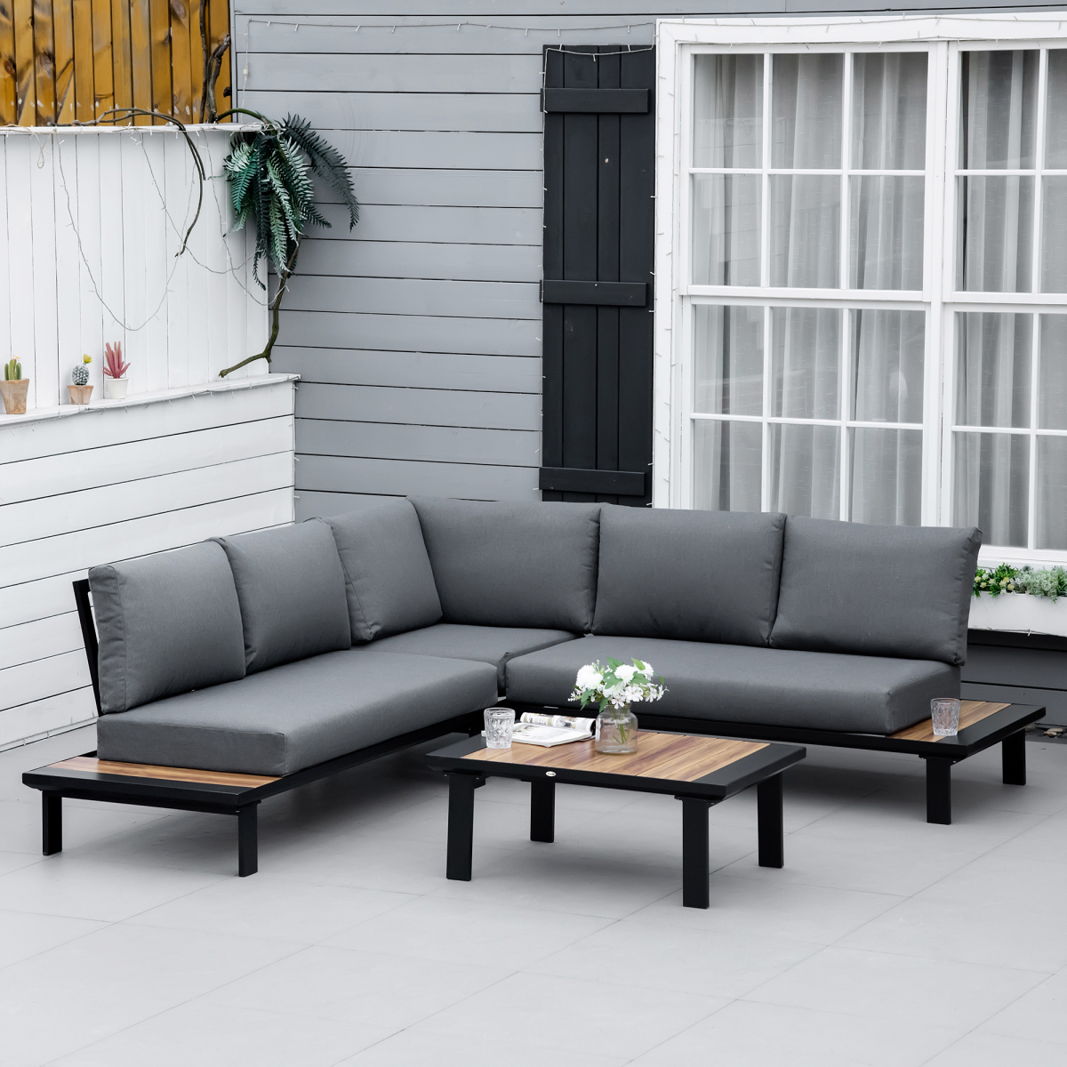 Outsunny 4-piece garden furniture conversation set with loveseat and table in grey, ideal for outdoor patio seating.