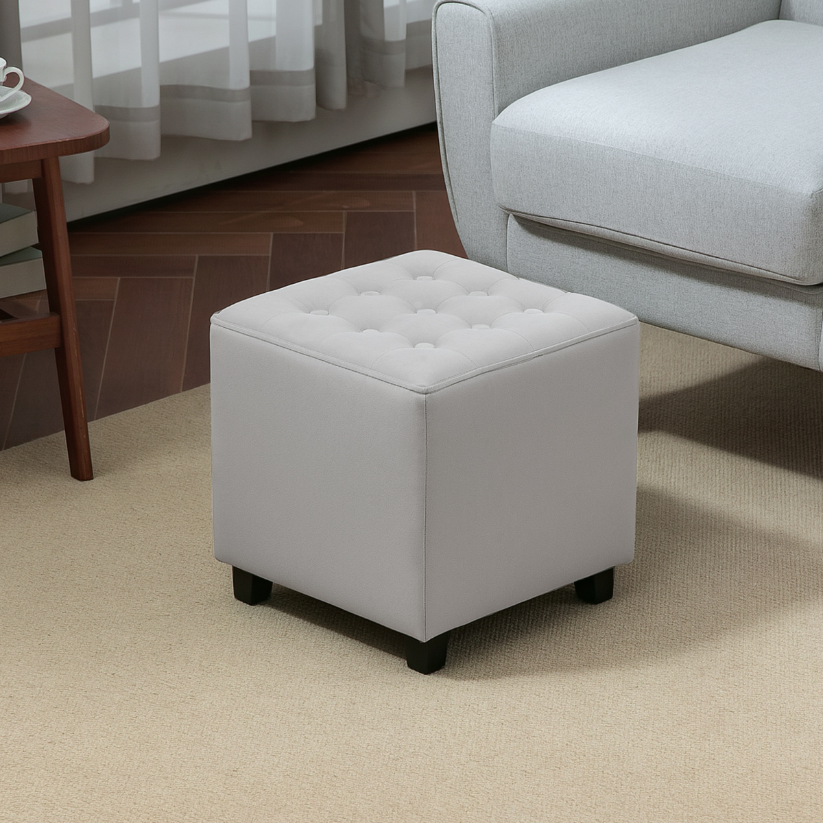 Small HOMCOM square footstool with wooden legs, versatile ottoman for bedroom seating or decor.