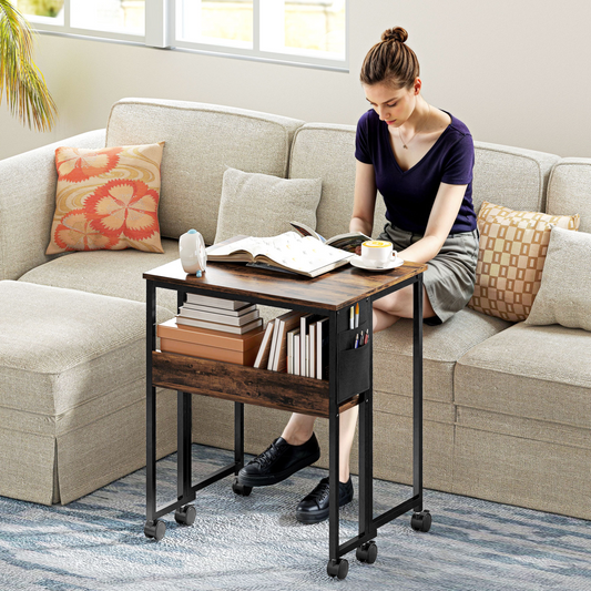 HOMCOM foldable computer desk on wheels, 63cm wide, with a sleek black surface and mobile caster wheels for easy mobility.