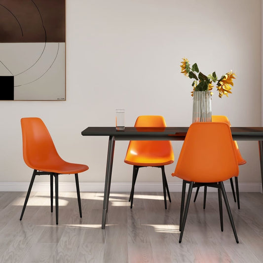 Two white vidaXL dining chairs made of durable PP plastic, featuring a modern design and sturdy legs for comfortable seating.