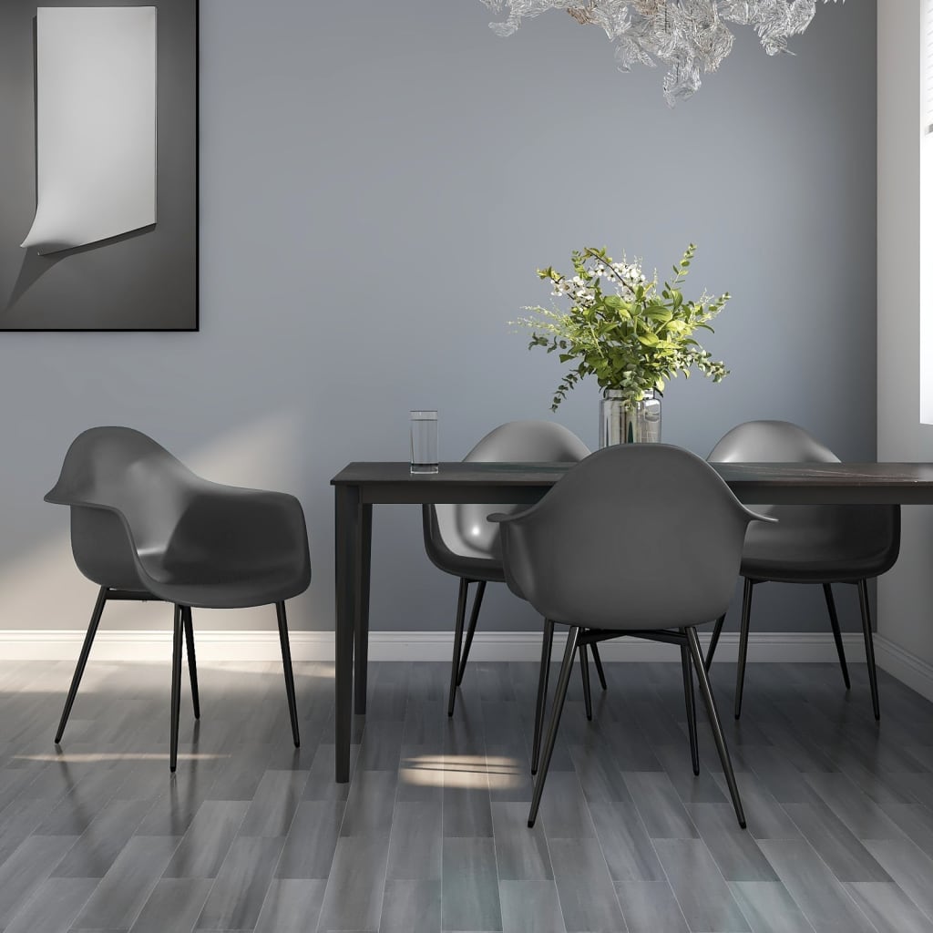 Pair of white PP dining chairs from vidaXL, modern design with smooth surfaces and sturdy legs, suitable for kitchen or dining room.