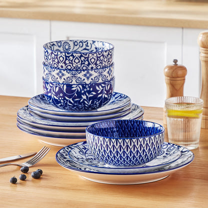 Set of Chinese blue and white porcelain dinner plates, dessert plates, and cereal bowls by Livoshop for elegant tableware.