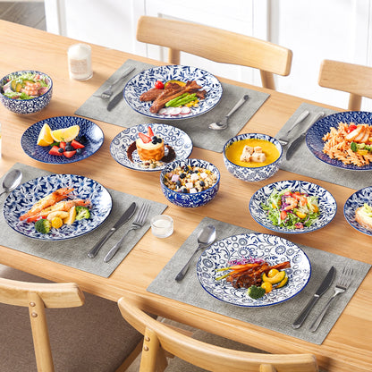 Set of blue and white Chinese porcelain dinner plates, dessert plates, and cereal bowls from Livoshop porcelain tableware collection.