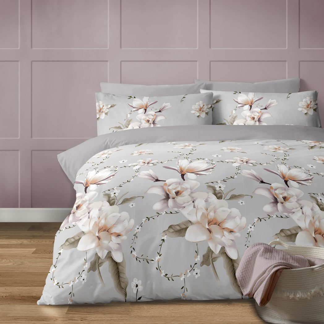 Gray Anemone duvet cover set with large white floral print by Bellissimo Home, showing the fabric and floral design.