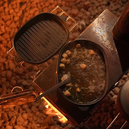 HOMCOM 2-in-1 cast iron Dutch oven and skillet with lid, suitable for stew, frying, and camping cooking, UK style.