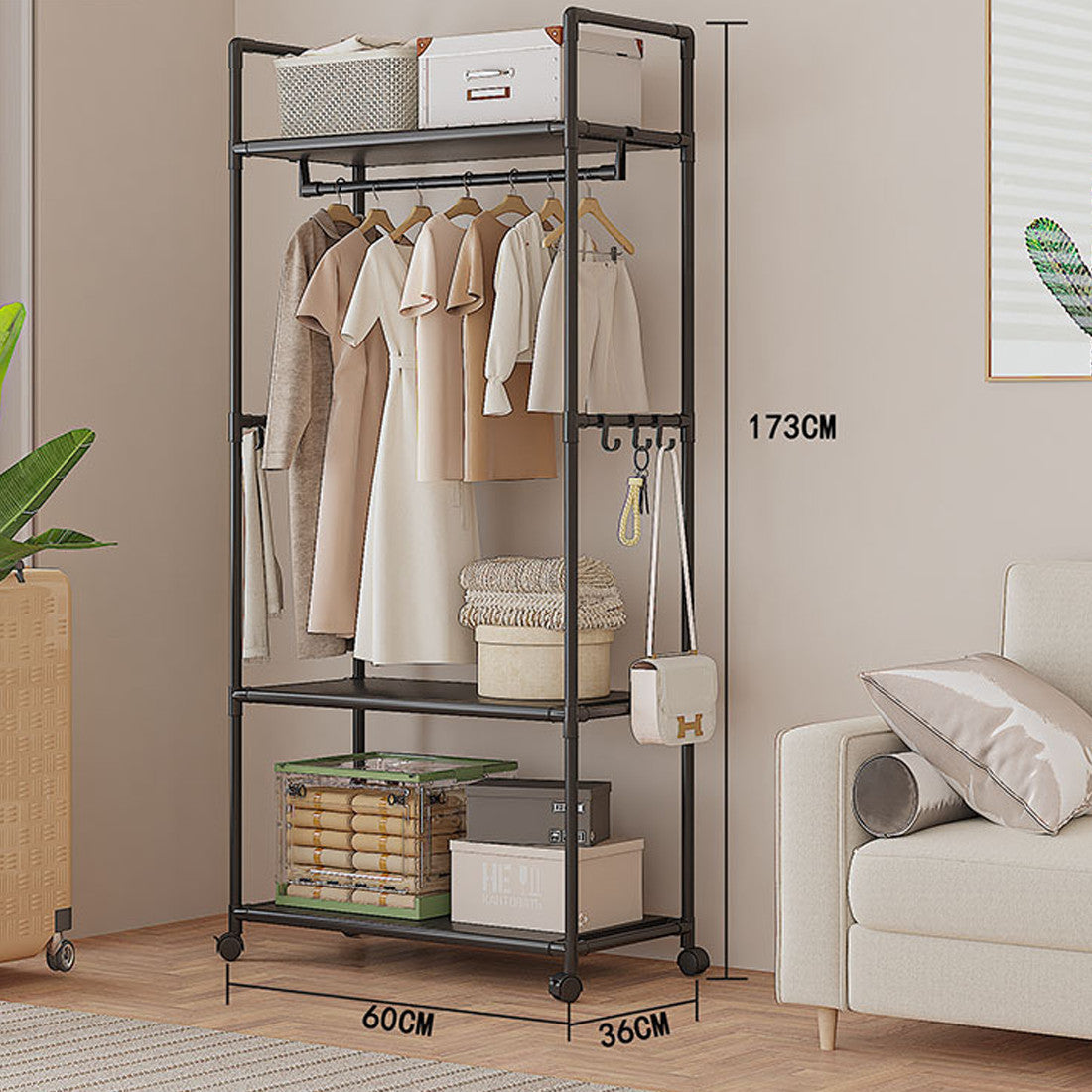 Black HOMCOM multifunctional clothes rail and shoe rack with storage shelf, versatile garment hanging stand for home organization.