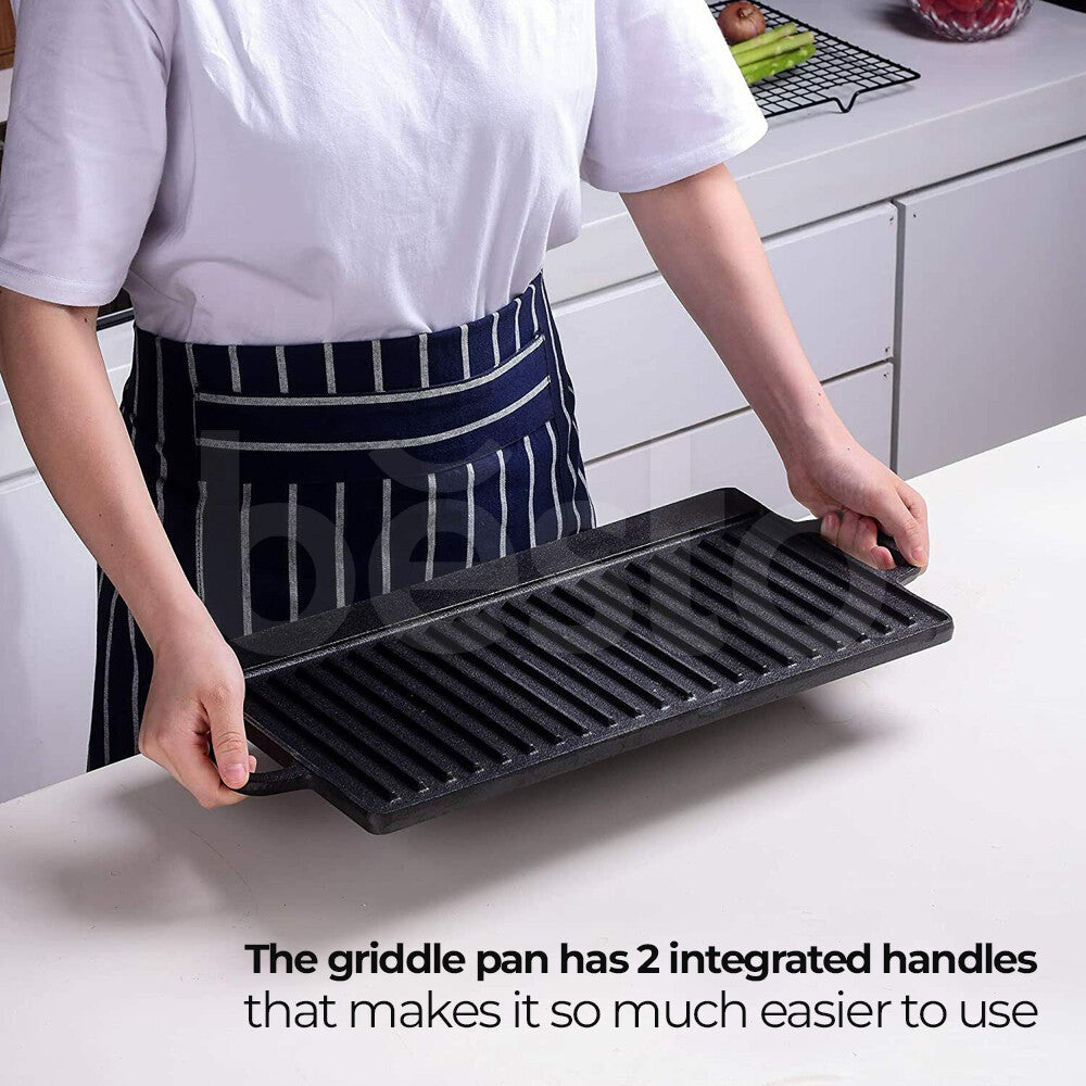 Cast iron reversible BBQ skillet by HOMCOM with a flat griddle side and grill ridged side for versatile outdoor cooking.