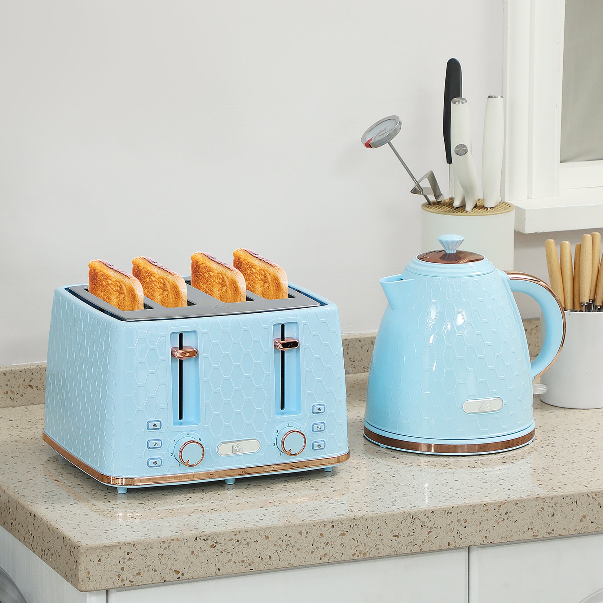 Light blue HOMCOM kettle and 4-slice toaster set with 7 browning levels, 1.7L capacity, and 3000W fast boil functionality.