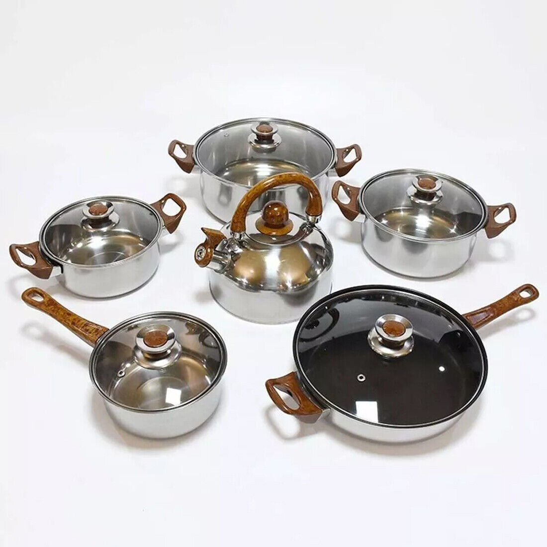 HOMCOM 12-piece stainless steel cookware set with saucepans, casseroles, fry pans, and glass lids on a kitchen countertop.