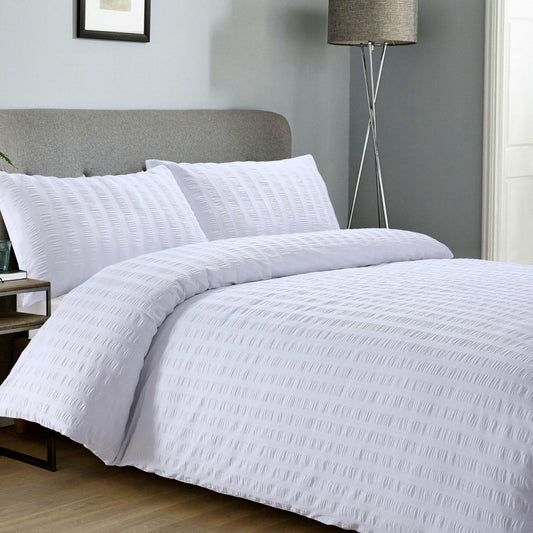 White polycotton duvet cover set for single bed by Bellissimo Home, featuring a soft, smooth fabric with a clean, minimalist design.