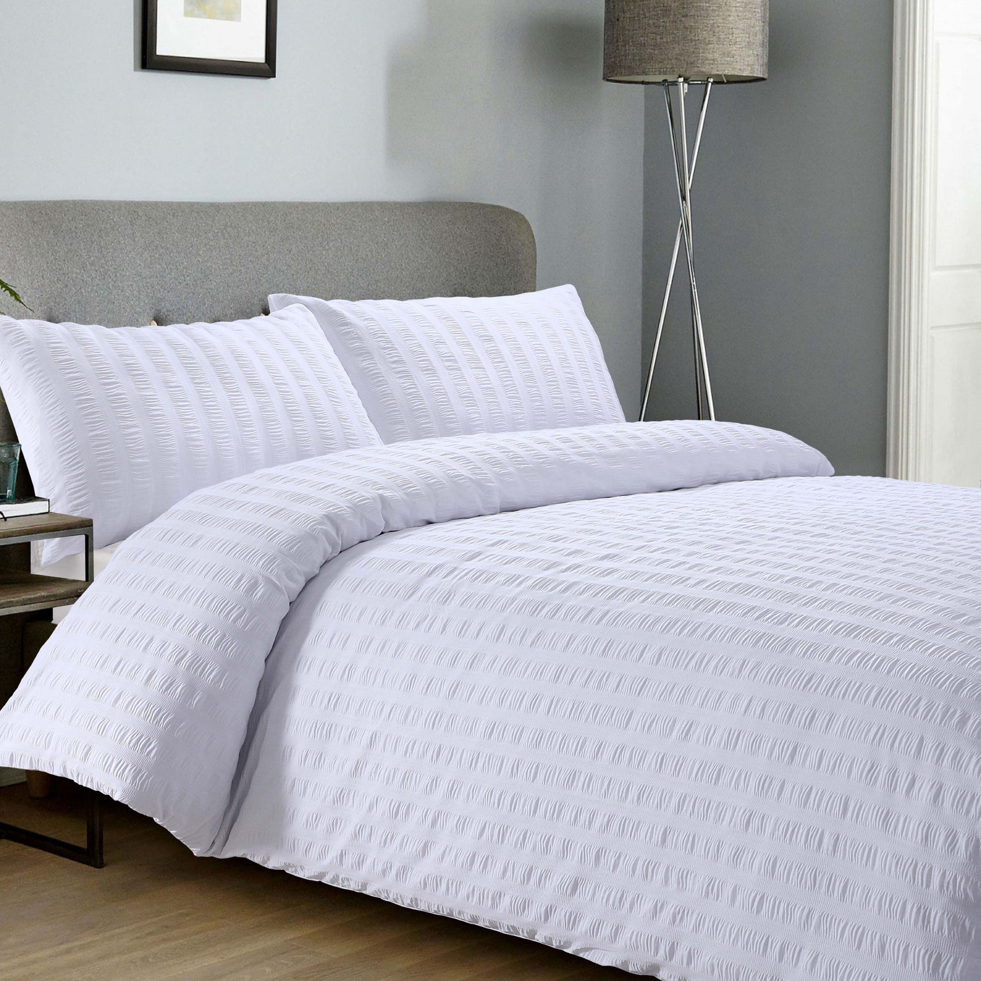 White polycotton duvet cover set from Bellissimo Home, featuring a smooth, soft fabric design for single beds.