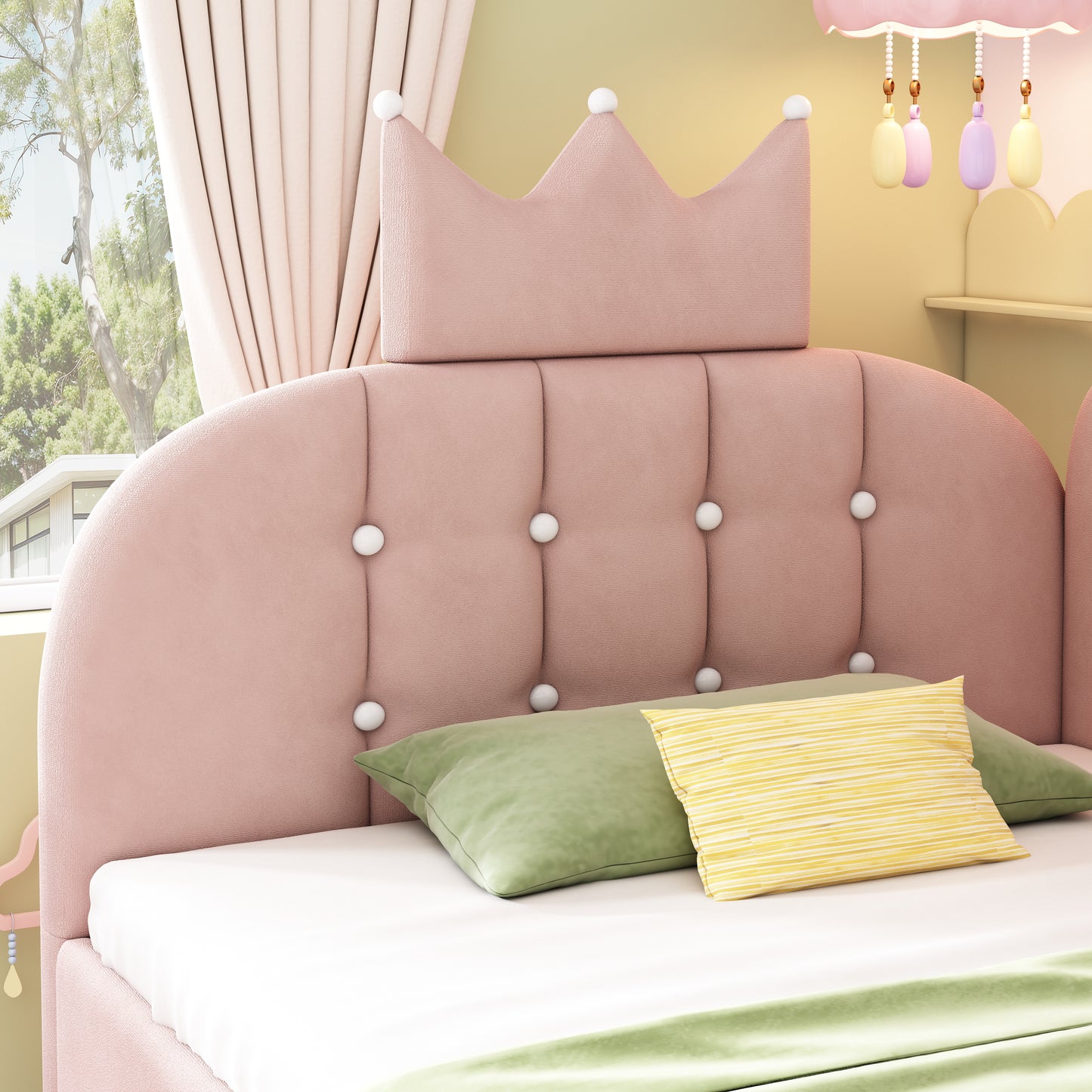 Pink velvet upholstered daybed with crown-shaped trundle, metal slatted frame, and pull-out bed for guests, by HOMCOM.
