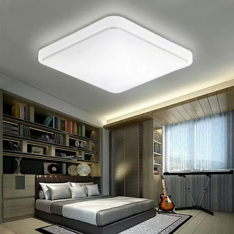 HOMCOM modern square LED ceiling light panel, 24W, installed in a bathroom ceiling with sleek white design for home lighting.