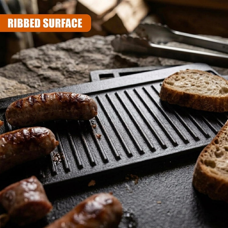 Cast iron HOMCOM reversible griddle plate with flat and ridged sides for grilling and frying in a double-sided BBQ skillet.