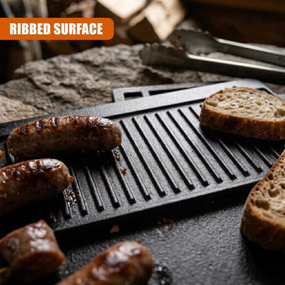 Cast iron HOMCOM reversible griddle plate with flat and ridged sides for grilling and frying in a double-sided BBQ skillet.