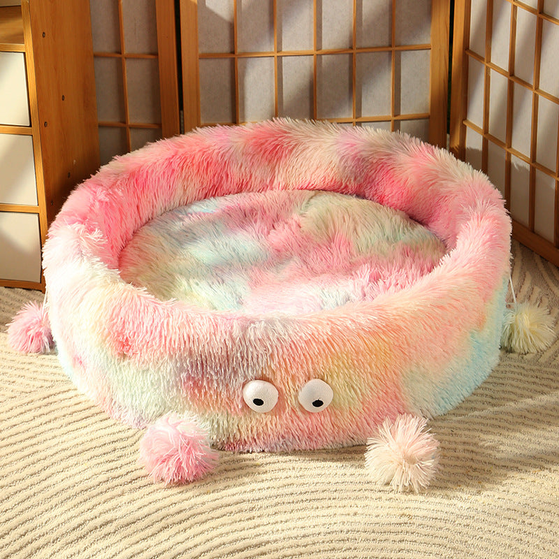 Cute winter pet bed by HOMCOM featuring a round, nest-style design with a small monster cat motif for cats and small dogs.