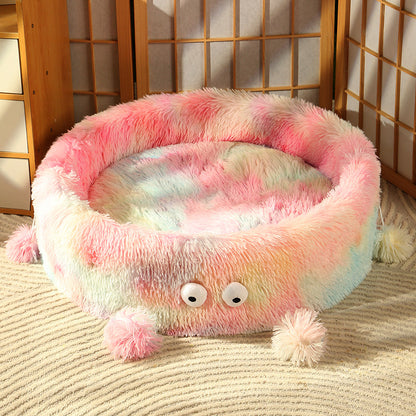 Cute winter pet bed by HOMCOM featuring a round, nest-style design with a small monster cat motif for cats and small dogs.