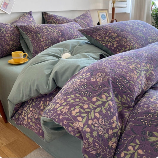 HOMCOM four-piece cotton double-layer bedding set with pillows and duvet cover displayed on a bed in a cozy bedroom.