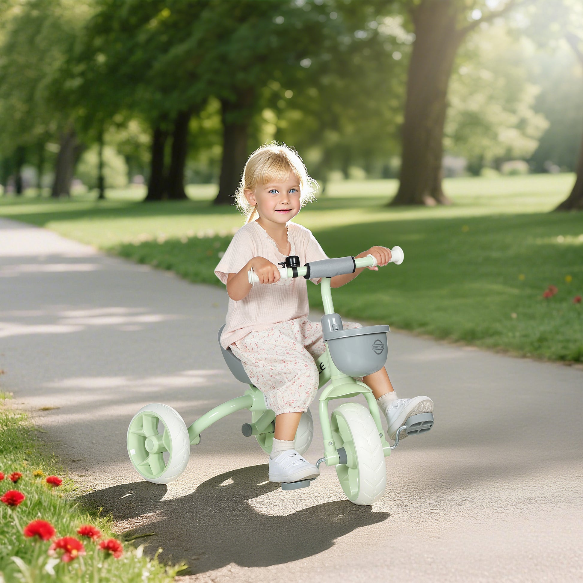 Green HOMCOM kids trike with front basket, EVA wheels, suitable for ages 2-5, designed for indoor and outdoor play for boys and girls.