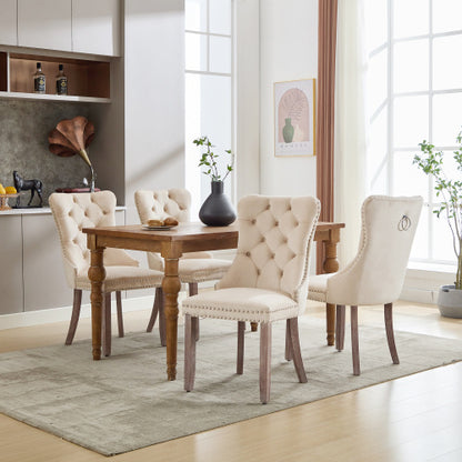 Set of 4 beige velvet dining chairs with button tufted design and wooden legs, modern style by eprolo.
