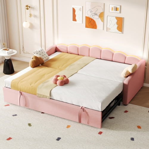 Pink petal-shaped upholstered daybed by eprolo with velvet fabric, RGB LED lighting, and pull-out trundle in 3ft size.