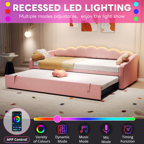 Pink petal-shaped upholstered daybed by eprolo with velvet fabric, RGB LED lighting, and a pull-out trundle in 3ft size.