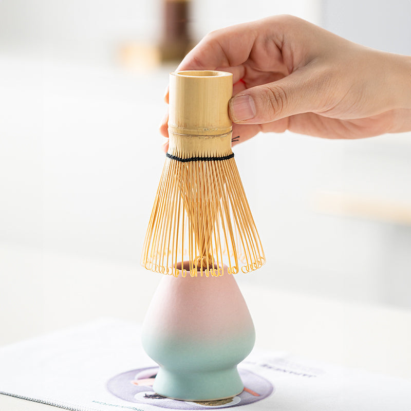 Premium 8-piece matcha tea set by eprolo featuring ceramic chawan bowl, whisk, and gift box in pink and green gradient colors.