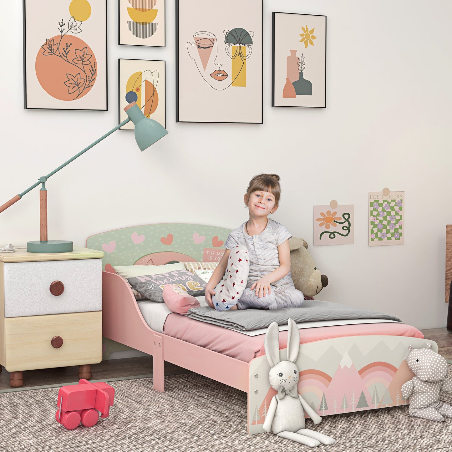 Pink HOMCOM ZONEKIZ toddler bed frame with a sturdy wooden design, suitable for kids aged 3 to 6 years, in a children's bedroom setting.