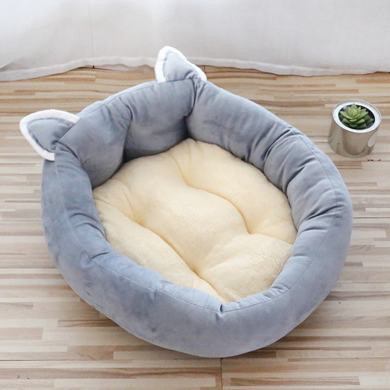 HOMCOM pet bed pad with thickened cushioning and high backrest featuring a playful cartoon design for comfort and support.