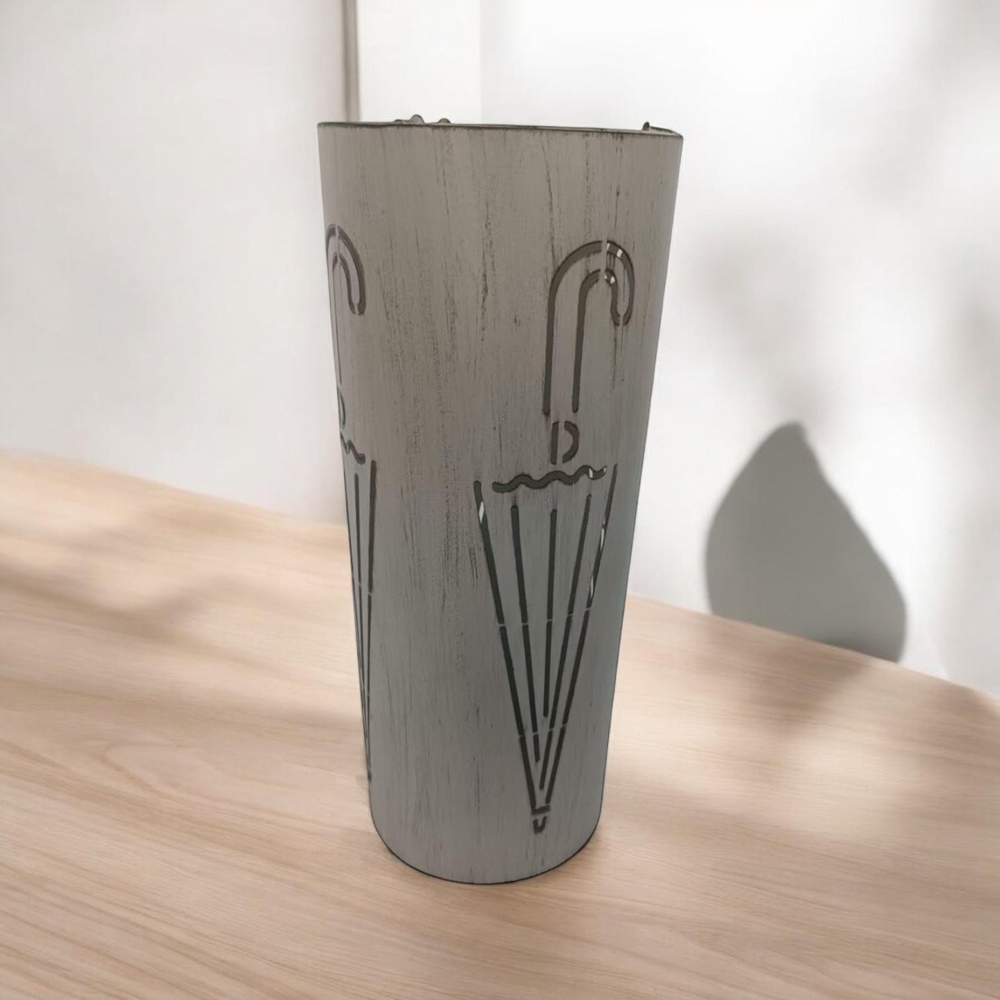 Cream metal umbrella stand, 49cm tall, with a sleek design and sturdy construction by MSL.