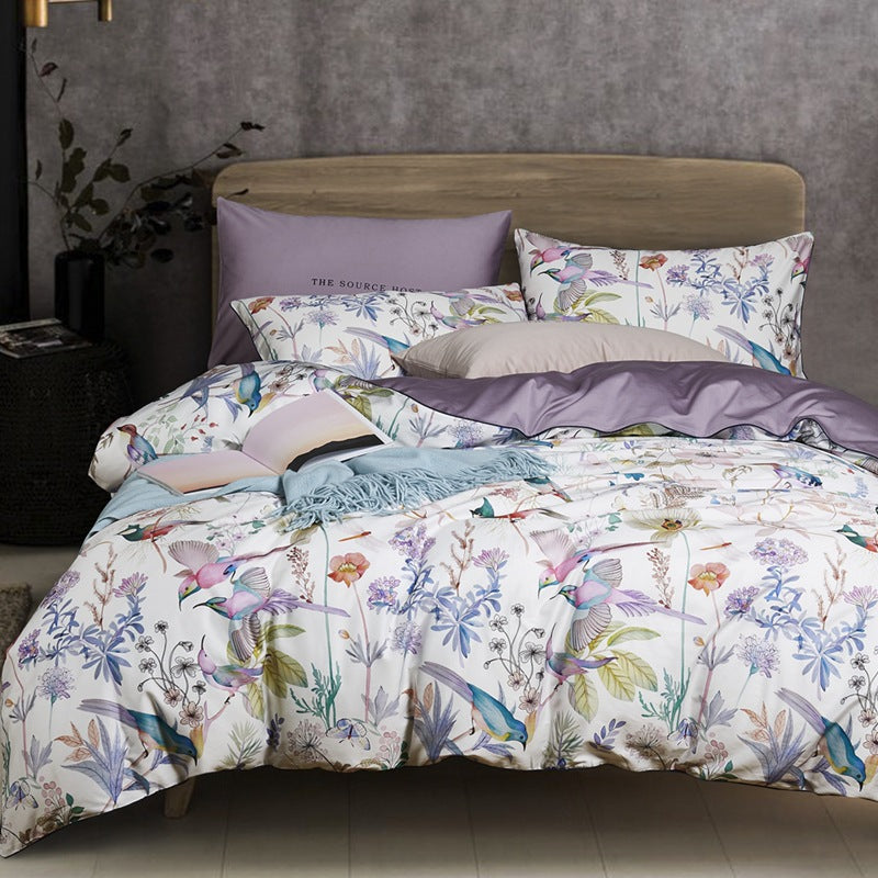 American style HOMCOM four-piece cotton bed set with a sleek design, featuring a bed frame and matching bedding.