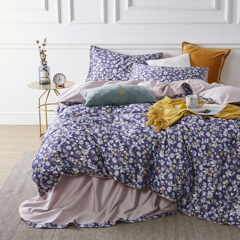 American style four-piece cotton bed by HOMCOM with a modern frame and cozy bedding, shown in a well-lit bedroom setting.