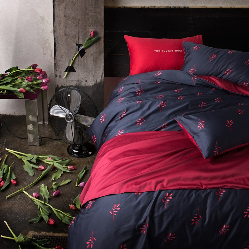 American style four-piece cotton bed by HOMCOM, featuring a sturdy frame and soft fabric upholstery in the image.