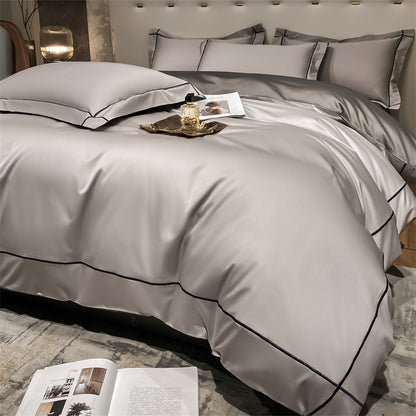 Beige cotton bedding set with flat sheet and pillowcases from HOMCOM's Long Staple Cotton Pressing Line New Dimeng series.