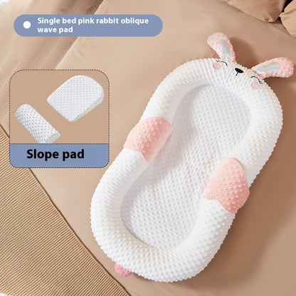 Cute HOMCOM baby suit for newborns with bionic bed design, portable and movable pressure support for comfortable rest.