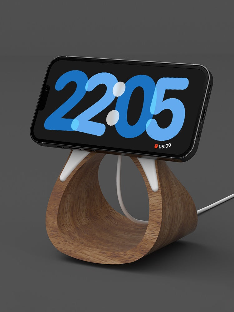 HOMCOM magnetic mobile phone wireless charging bracket holding a smartphone for easy charging and secure mounting.