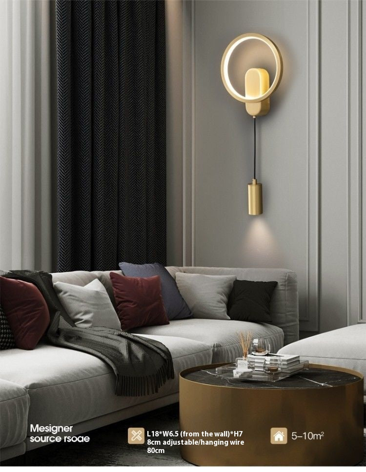 HOMCOM black and gold round wall lamp, luxury bedroom bedside light with modern design, mounted on bedroom wall.