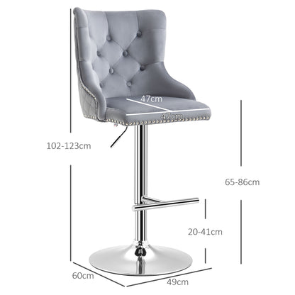 Set of 2 HOMCOM grey velvet bar stools with tufted backrests, adjustable height, and swivel feature for breakfast bar seating.