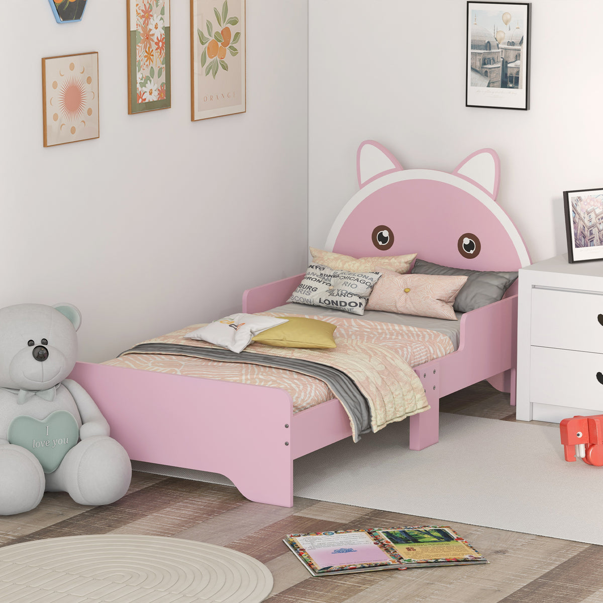Pink HOMCOM ZONEKIZ kids' bed with cat design, toddler bed frame with guardrails, suitable for ages 3-6, measuring 143x74x72 cm.
