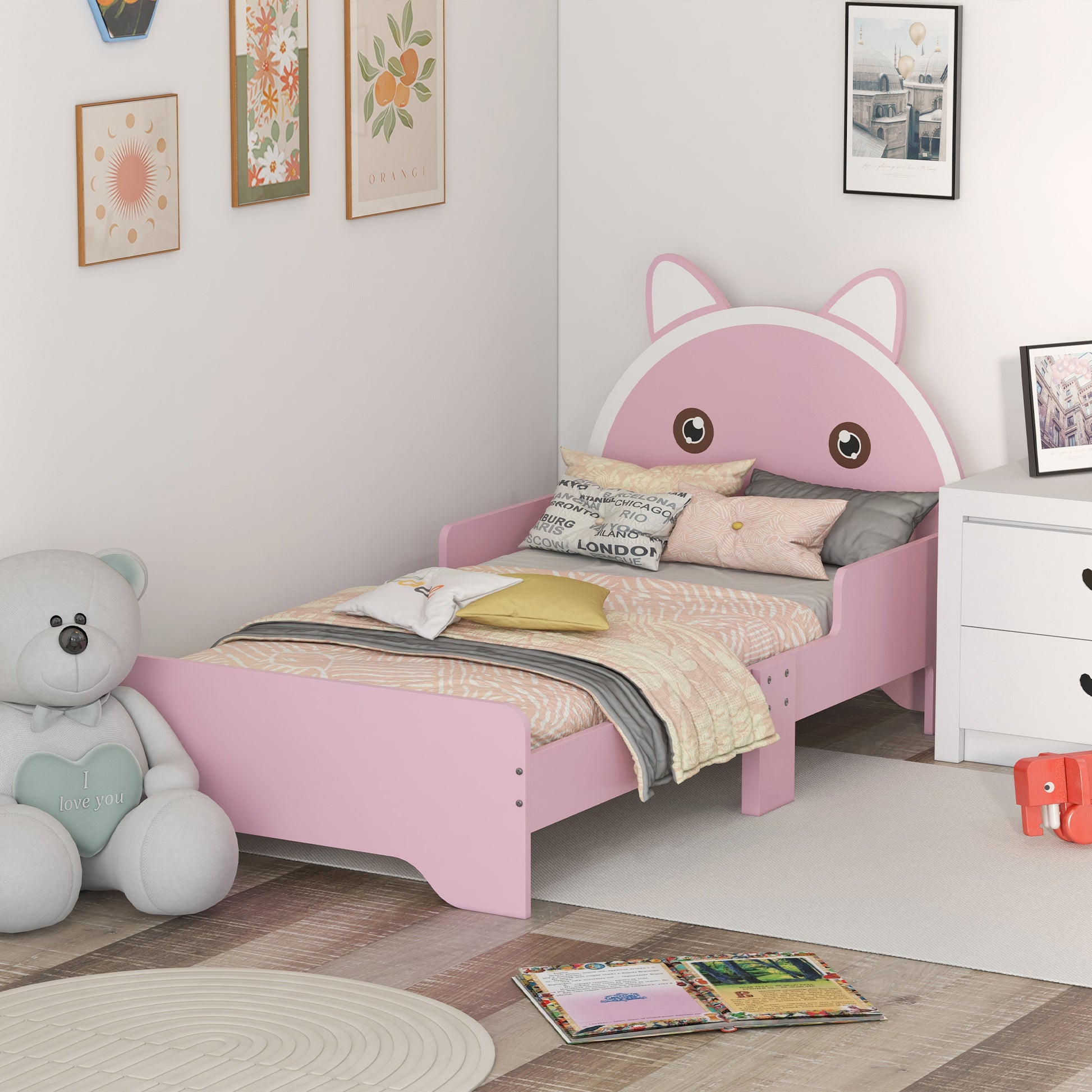 Pink HOMCOM ZONEKIZ kids' bed with cat design, toddler bed frame with guardrails, suitable for ages 3-6, measuring 143x74x72 cm.